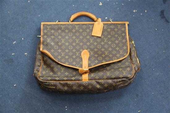 A large Louis Vuitton suitcase, 21in.